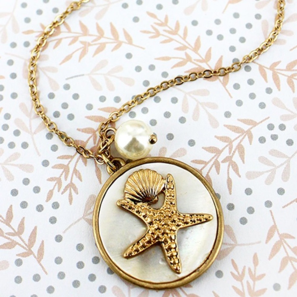 Goldtone & Faux Mother of Pearl Starfish Necklace - Picture 2 of 2